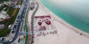 11000علم تُشكّل لوحة فنية للقائدين زايد وراشد