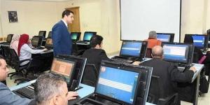 كيف حدد القانون قواعد التدريب والتأهيل بالجهاز الإداري لرفع كفاءة الموظفين؟